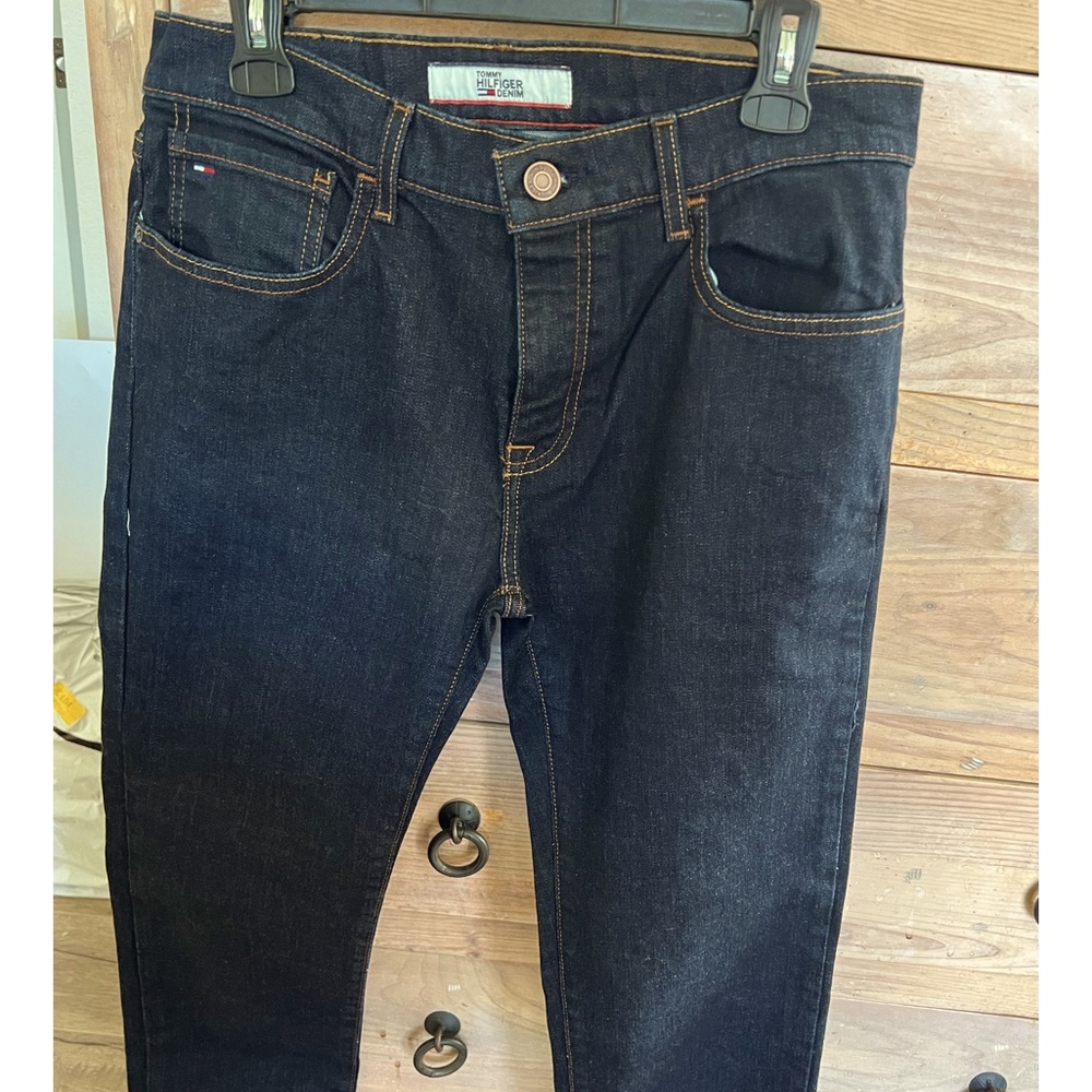 Dark blue Men’s Tommy Hilfiger jeans. New without tags. Dark blue almost black.